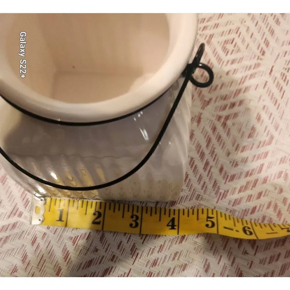 Napco cream ceramic jars with metal wire hangers